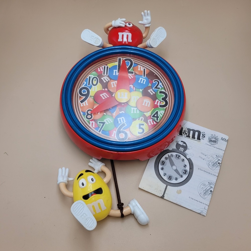 M&M's Pendulum Wall Clock Whimsical Sounds not tested for parts or repair